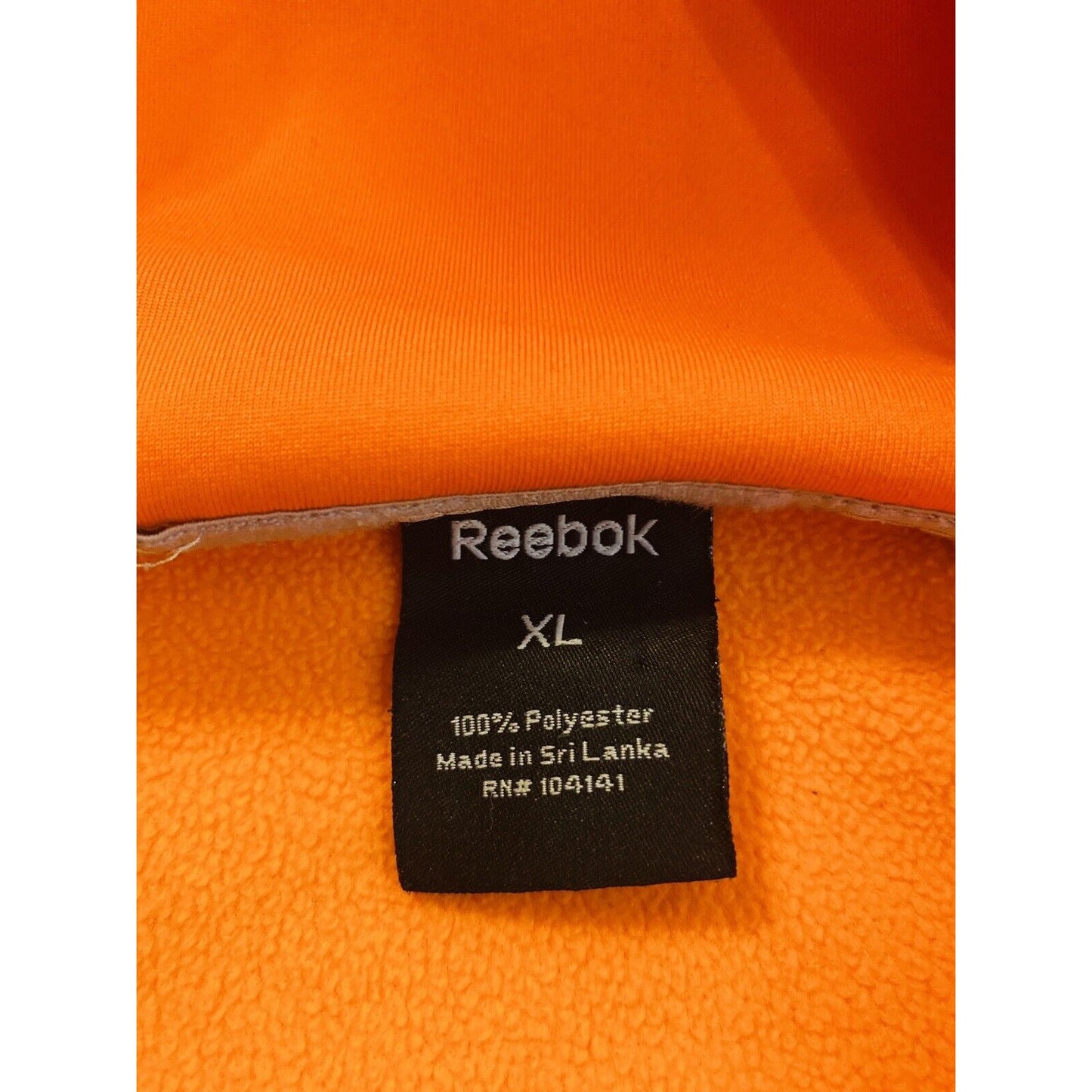 Vintage REEBOK XL Polyester Bright Orange Zip-up Hoodie w/ Geometric Design