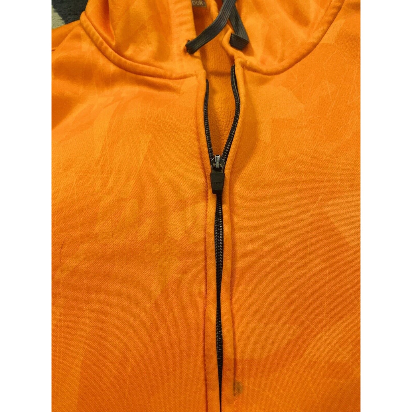 Vintage REEBOK XL Polyester Bright Orange Zip-up Hoodie w/ Geometric Design