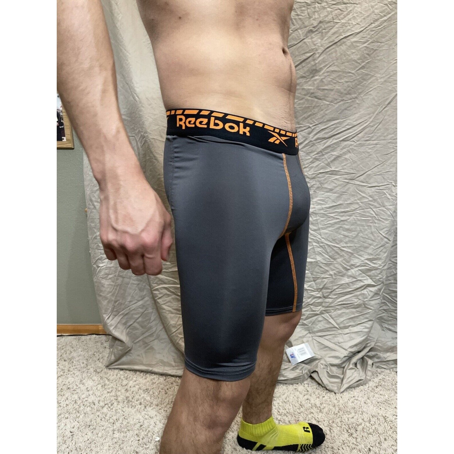 Men's gray reebok medium orange band compression shorts
