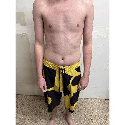 men’s analog skze 33 design unlikely futures yellow and black board shorts