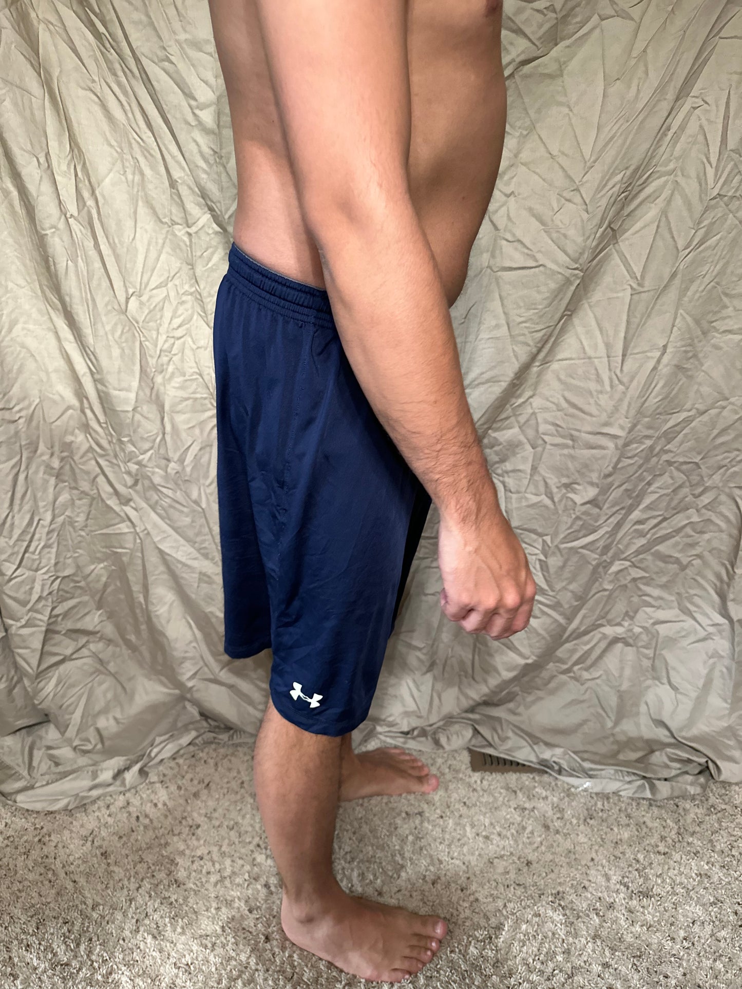 Men’s navy blue under armour heat gear loose shorts athletic no pockets rampart ridge high school track and field
