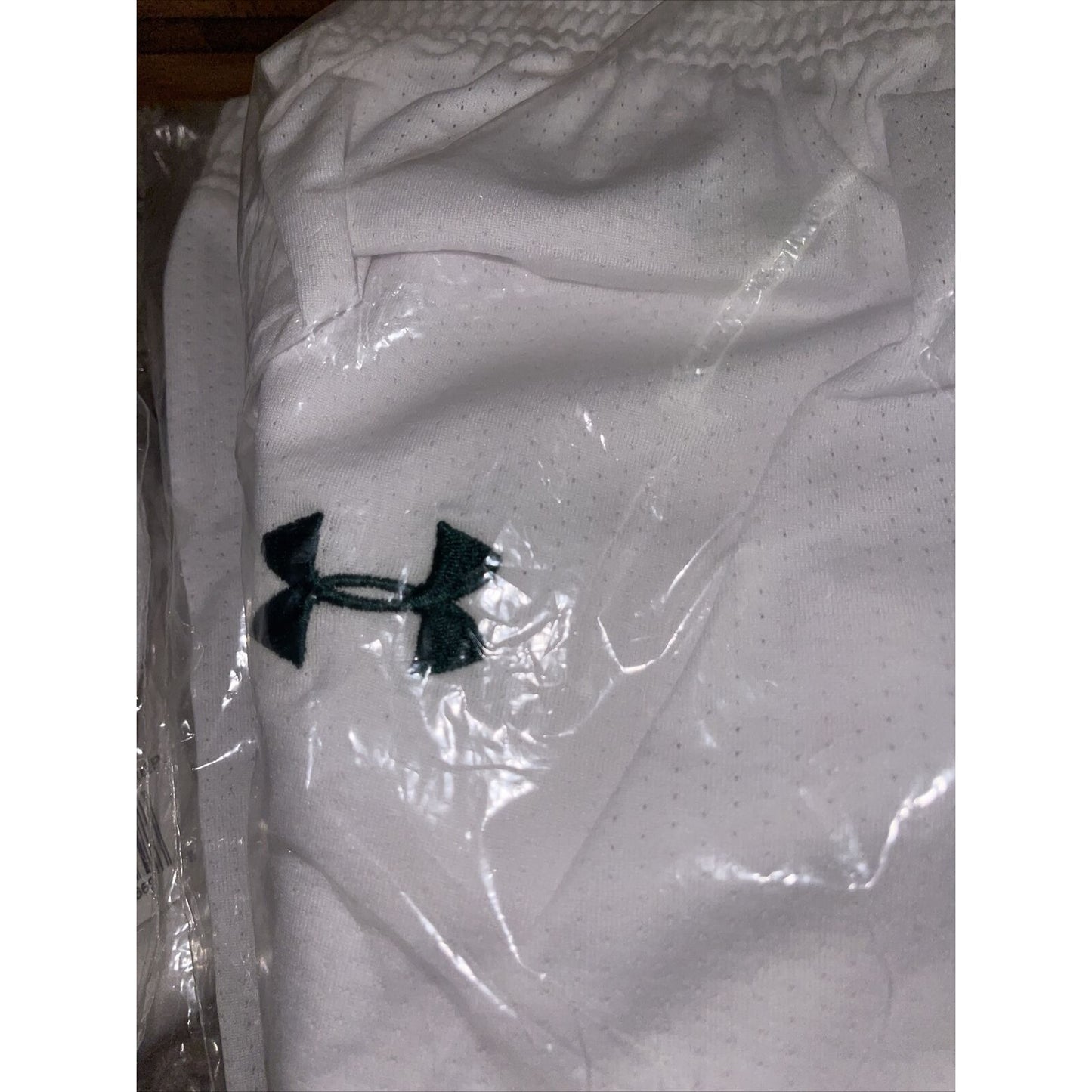 Boy's under armour Youth Large white and Green Lacrosse style shorts no pockets