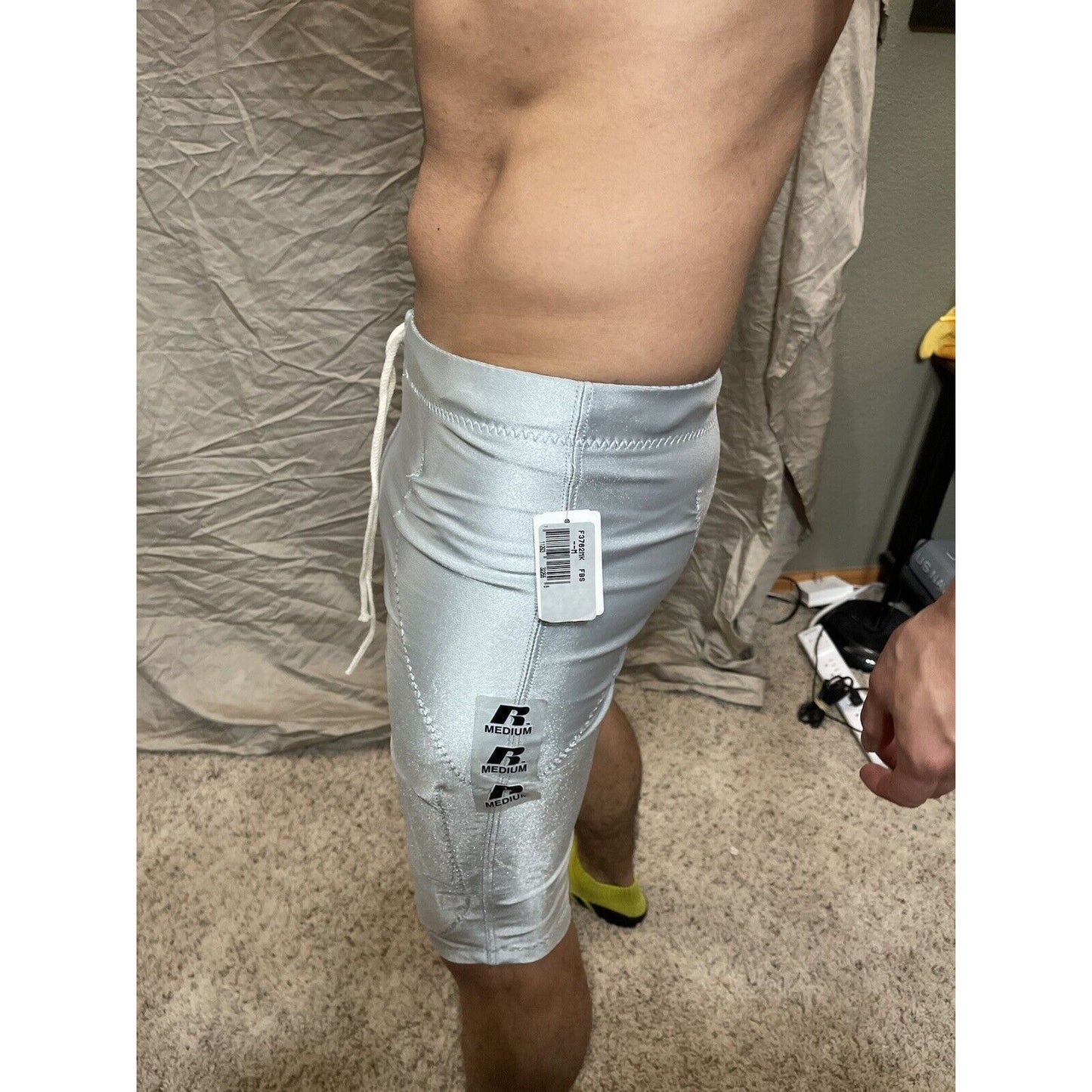 Men's silver russell athletic football pants Small