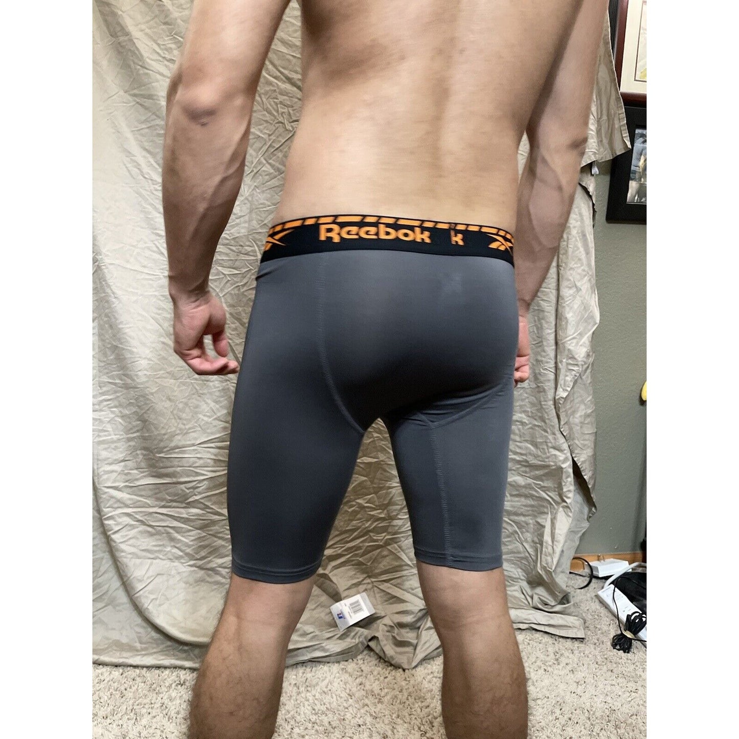 Men's gray reebok medium orange band compression shorts